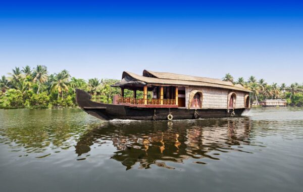 Sail Kerala's waterways on a houseboat