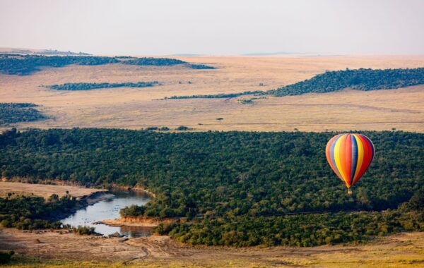 See dawn over the Masai Mara in a hot air balloon