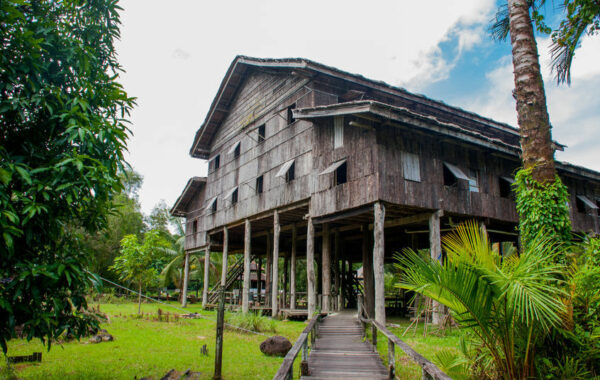 Learn about the Iban in a longhouse