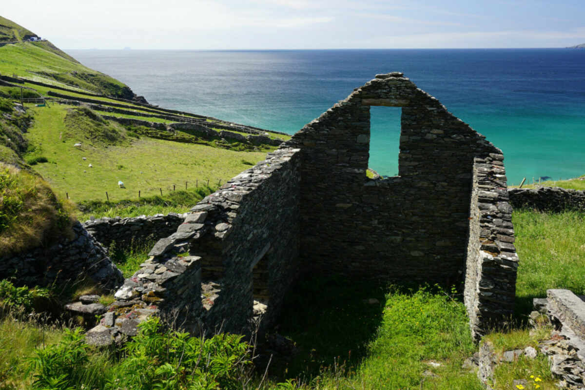 Remains of the abandoned house on shore in Dingle peninsula in South Ireland