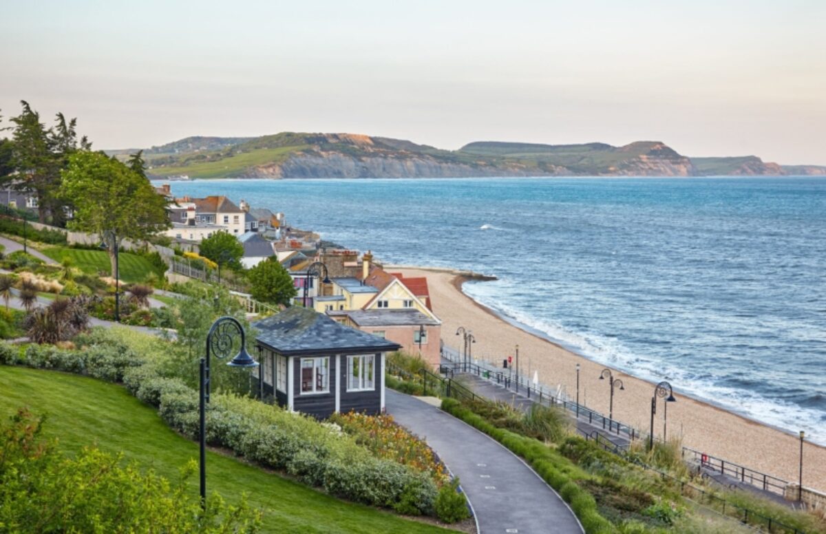 Budget Lyme Regis and Lyme Bay with the Dorset coast including the Golden Cap on the background West Dorset England UK